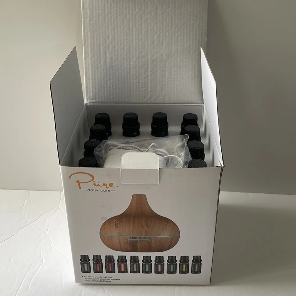 NIB Pure Daily Care Ultrasonic Aromatherapy Diffuser with 10 Pure Essential Oils